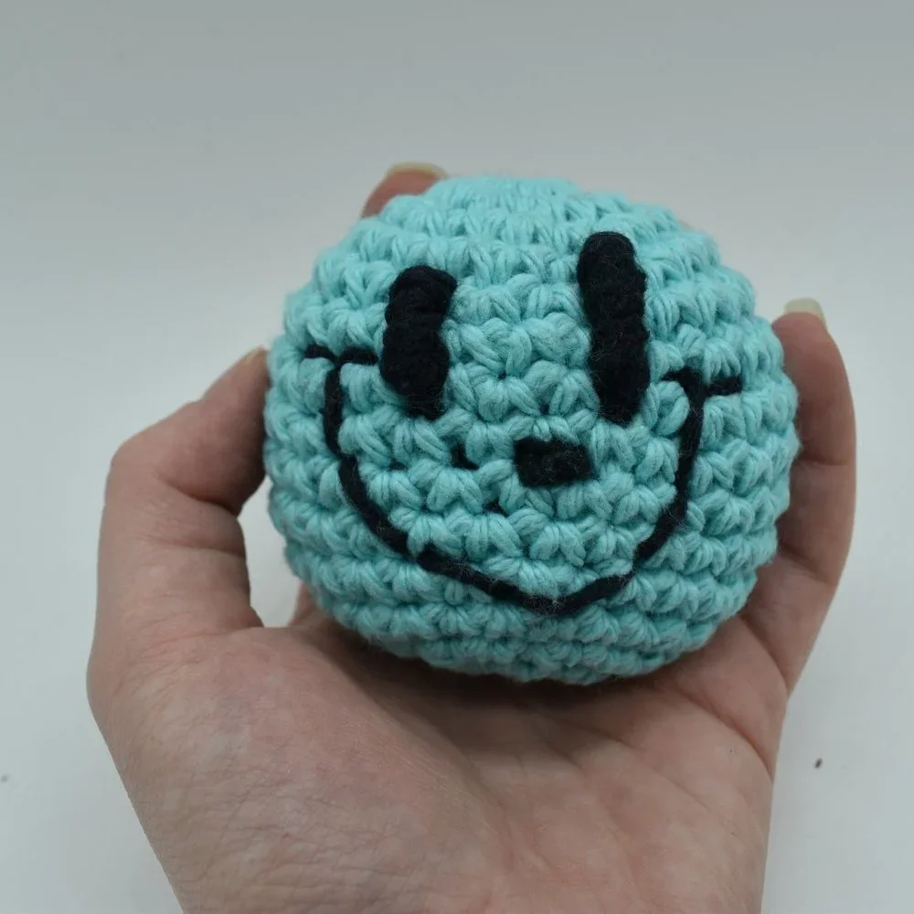Handcrafted crochet catnip happy face cat toy